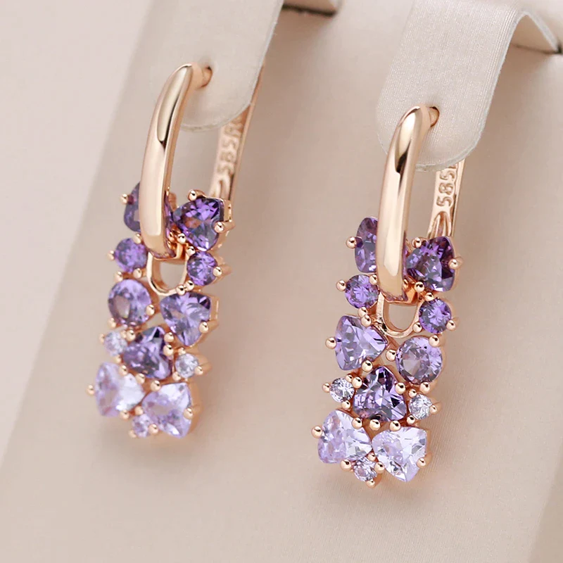 Eleganti orecchini con zirconi viola in oro