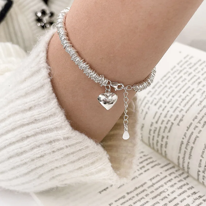 Elegante cavigliera con cuore in argento