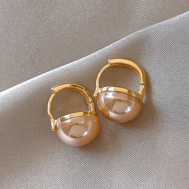 Eleganti orecchini in oro con perle rosa